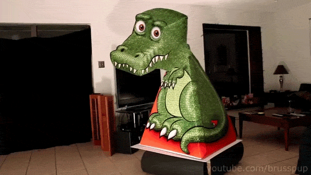 une-incroyable-illusion-doptique-vous-donne-limpression-que-ce-t-rex-vous-suit-du-regard-GIF