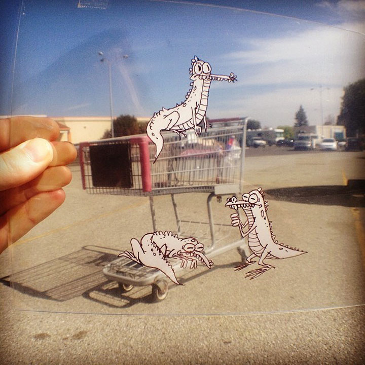 artiste-insere-dessins-sur-film-transparent