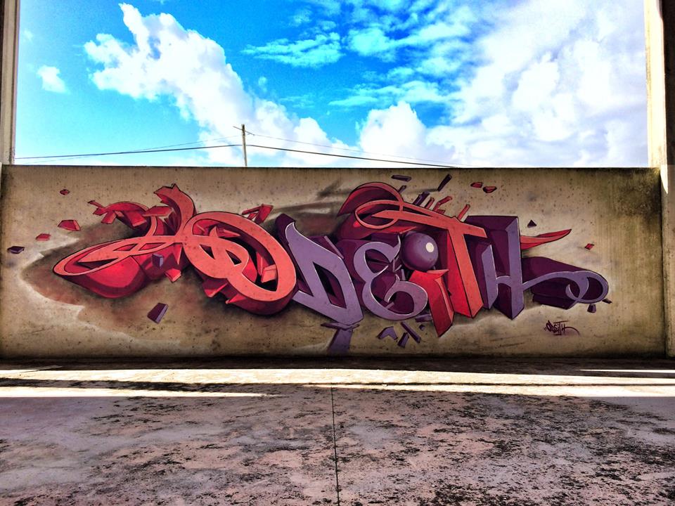 odeith-graffiti-relief-ciel-bleu-muret