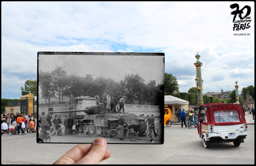 Les passants inspectent l’épave d’un tank allemand devant l’entrée du jardin des Tuileries.