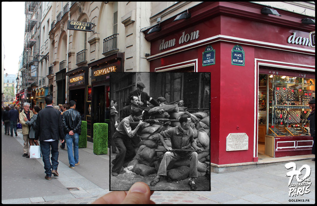 Rue de la Huchette. Les parisiens en armes posent devant l’objectif de Robert Doisneau.